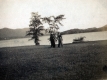 Women Holding hands walking toward Lake Dunmore