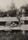 Three Children on a Fence