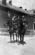 Two Men on Horseback