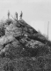Three Men on a Rocky Outcrop