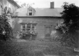 House with Chimney and Flowers