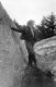 Woman Leaning on Rock