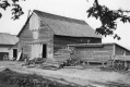 Timber in Front of a Barn