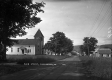 Church, Dwellings, and Commercial Buildings on Main Street