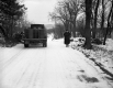 Woman by Truck in Rural Vermont