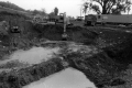 Backhoe Digging a Hole
