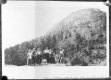 Hikers Beside Mountaintop