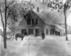 House with Horse-Drawn Sled