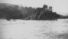 Barn Crashing into Bridge