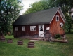 Bicycles by a House