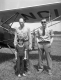 Young Girl by a Plane