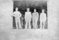 Four Men in a Barn