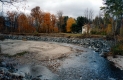 House by a River in Autumn