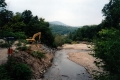 Backhoe on Riverbank