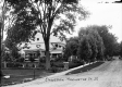 Stately Dwellings along Dirt Road in Manchester