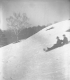 Two people on toboggan