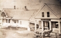 Horse drawn carriage in front of Perry Brothers