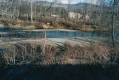 Front of Percy's Garage across Little River
