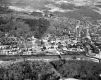 Aerial Looking Into Montpelier: Visible Front of State House and River with Bridges