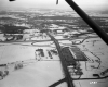 Aerial View of Burlington Area: Highway Next To Large Industrail Building in Winter