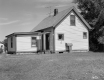 Two-story House with Chimney and Antenna