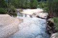 The Little River Weaves Along