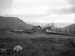 Houses in a Dirt Field