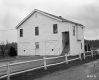 Garage Behind House To Left of A.R. Goyette Wholesale Co. Business