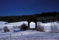 Covered Bridge in Snowy field 
