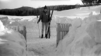 Warden farmyard: Jean with skis