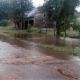 Water over the road by the storage shed at Warden Farm