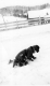 Child playing in the snow.