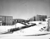Cadets in file at Norwich University in winter