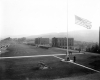Cadets saluting the flag at half-mast