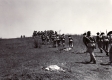 Cadets marching up hill with firearms