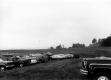 Automobiles in a Field