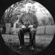 Amos Somers in front of ash house at farm
