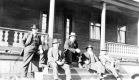 Five men on stoop