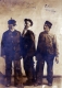 Three men stand for portrait L-R: ?, Bill Brock, Eben Willey