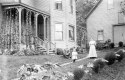 Young family in front of home