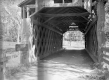 A Covered Bridge with Speed Limit