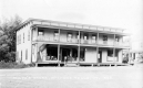 Wood-framed building with two porches