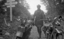 A Man with Two Bikes on the Trail