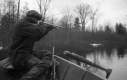 A Hunter Takes Aim from a Boat
