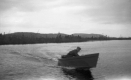 A Rowboat with an Onboard Motor