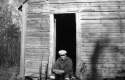 A Man at a Hut