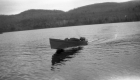 A Rowboat with an Onboard Motor