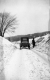 A Lone Car in the Snow