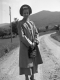 Woman on Dirt Road