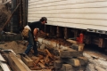 Working on a wood-framed house